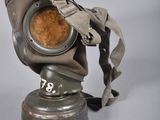 a gas mask that is sitting on top of a table