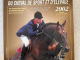 une image d'un magazine dont la couverture représente un cheval et un cavalier