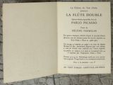 an open book with a picture of a dog on it