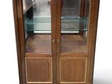 an image of a display cabinet with glass doors