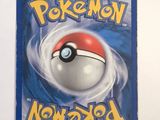 a picture of a pokemon card with a red and white ball on it