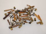 a lot of screws that are laying on a table