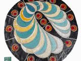 a picture of a colorful plate with a design on it