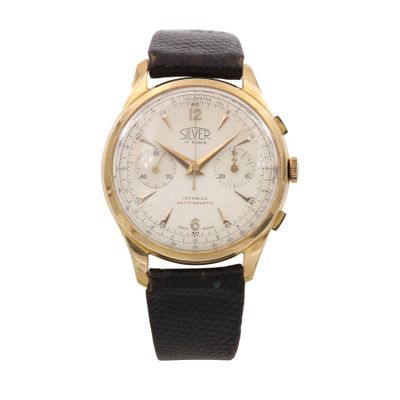a close up of a watch on a white background with a black strap