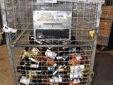 a metal cart with a bunch of items inside of it