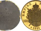 four different types of coins are shown on a white surface