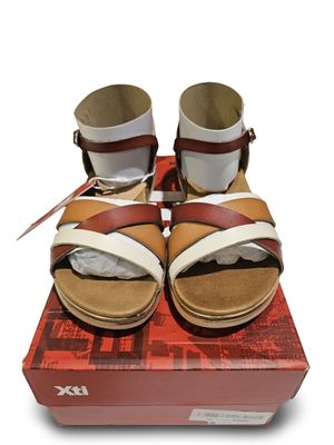 XTI - Ces sandales pour femme disposent de brides croisées a…