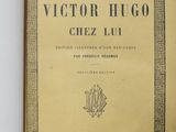 a yellow book with black writing on it sitting on a table