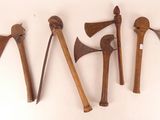 four different types of axes are displayed on a white surface