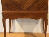 an image of a wooden desk with a drawer on top of it