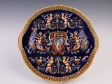 an image of a decorative plate with angels on it