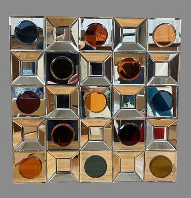 a mirror that has many different colored circles on it