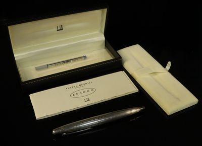 an image of a pen and a box with a pen in it