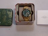 a box with a watch inside of it and a box with a watch inside of it