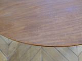an image of a wooden table on a herringle floor