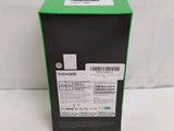the back of a box with a green label on it