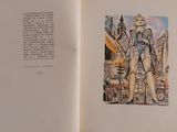 an open book with a drawing of a woman on it
