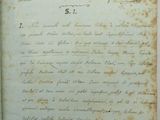 a close up of an old book with writing on it