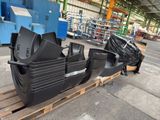 an image of a large pile of tvs on a pallet in a warehouse