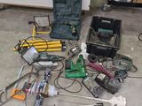 a lot of tools that are laying on the floor
