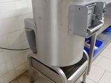 a machine that is sitting in the middle of a kitchen