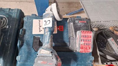 an image of a corded drill and other tools