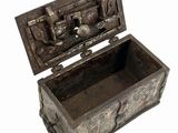 an old wooden box with a latch on it