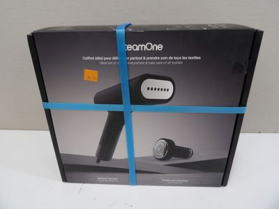 packaging for a hair dryer with a blue ribbon wrapped around it