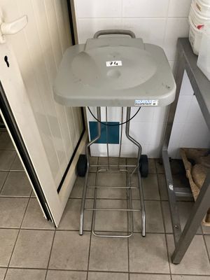 a small table that is sitting in the corner of a room