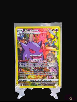 a close up of a pokemon card on a black background
