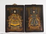 pair of asian painted wooden plaques of a woman and a man