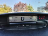 a digital display on the dashboard of a car