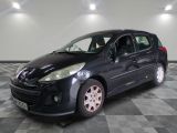 a picture of a black car parked in a garage