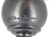 a silver vase with a name on it on a white background