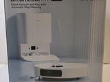 boxed box of a white toilet sitting on top of a white counter
