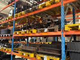 many different types of batteries on the shelves in the warehouse