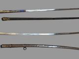four different types of swords are displayed on a gray surface