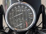 a close up of a speedometer on a motorcycle