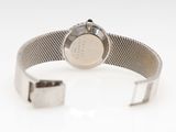 an image of a close up of a wrist watch on a white surface