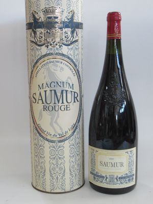 a bottle of wine sitting next to a box of wine