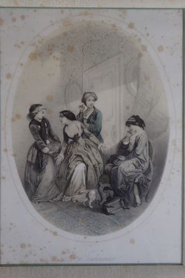 une photo d'un groupe de personnes assises autour d'une table