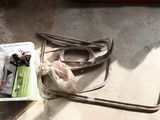 a box of tools and a pair of glasses on the floor
