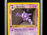 a close up of a card with a purple pokemon character on it