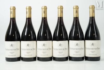 six bottles of wine are lined up on a white surface