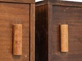 two brown wooden drawers with handles and handles on each side