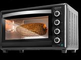 une photo d'un four grille-pain contenant une dinde