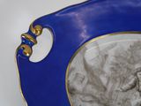 a blue picture frame with a picture of a woman on it