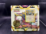 a close up of a box of pokemon cards on a table