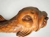 an image of a wooden sculpture of an elephant ' s head