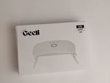 packaging of a white box with a picture of a coffee table in it